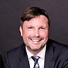Porträtbild von Dr. Ilkka-Peter Ahlborn
